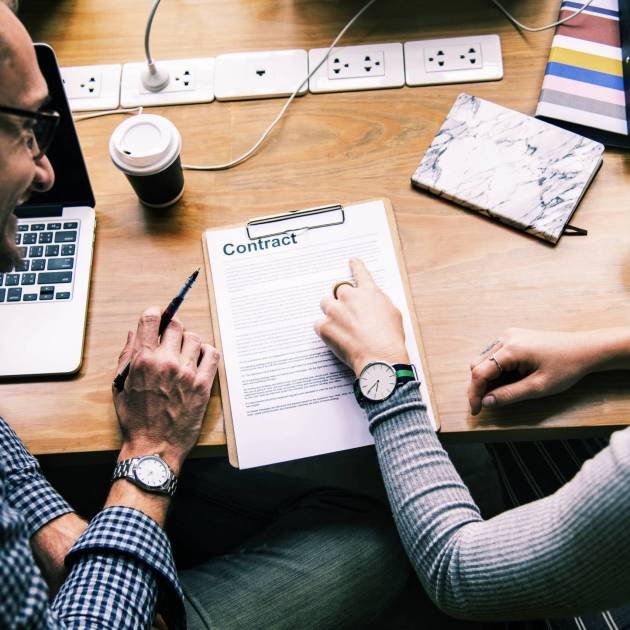 Business people discussing a contract